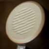 Underside of ceramic cup with textured base
