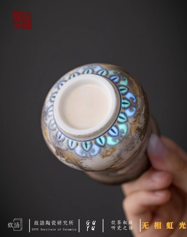 Decorative ceramic vase with intricate design.
